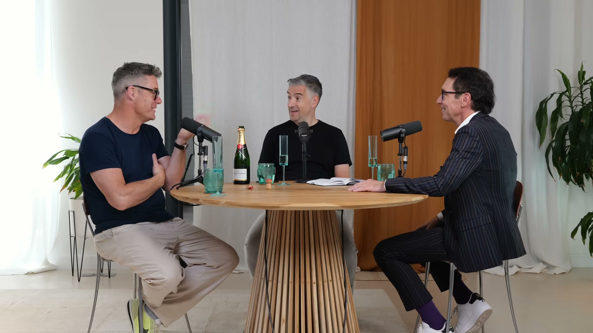 Byron Sharp, Jon Evans and Mark Ritson recording the Uncensored CMO episode over champagne
